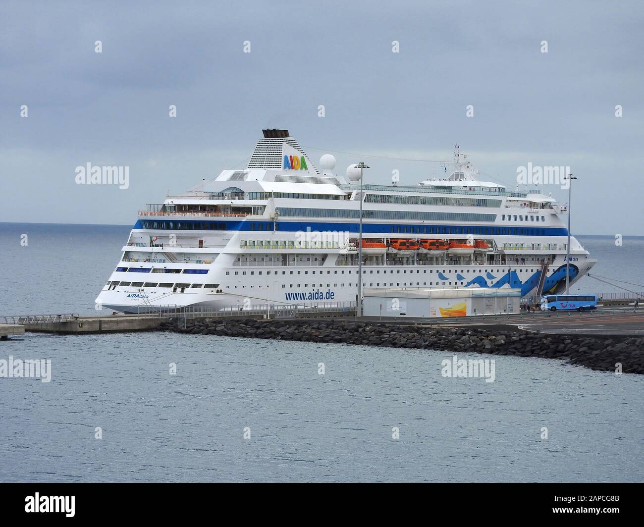 Cruise ship AIDAcara built by Kvaerner Masa-Yards Turku New Shipyard (Finland). Moored at   at Arrecife, Lanzarote, Canary Islands,Spain near the Castillo de San Jose, January 2020 Stock Photo