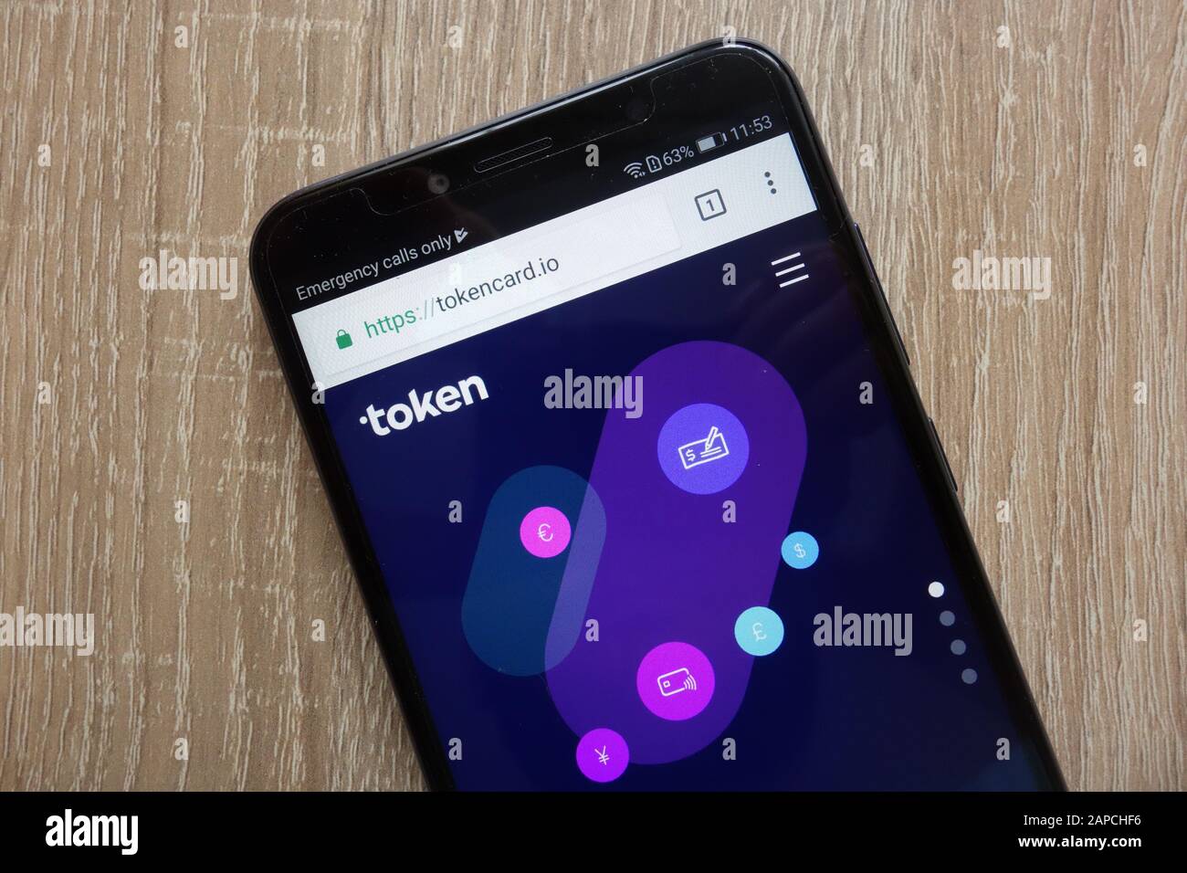 TokenCard (TKN) cryptocurrency website displayed on a modern smartphone Stock Photo