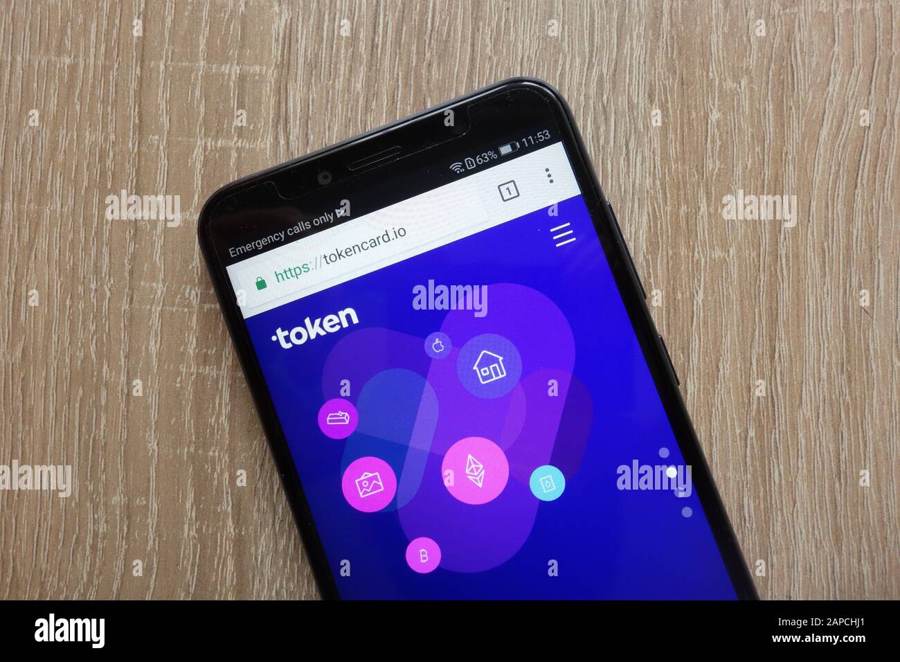 TokenCard (TKN) cryptocurrency website displayed on a modern smartphone Stock Photo