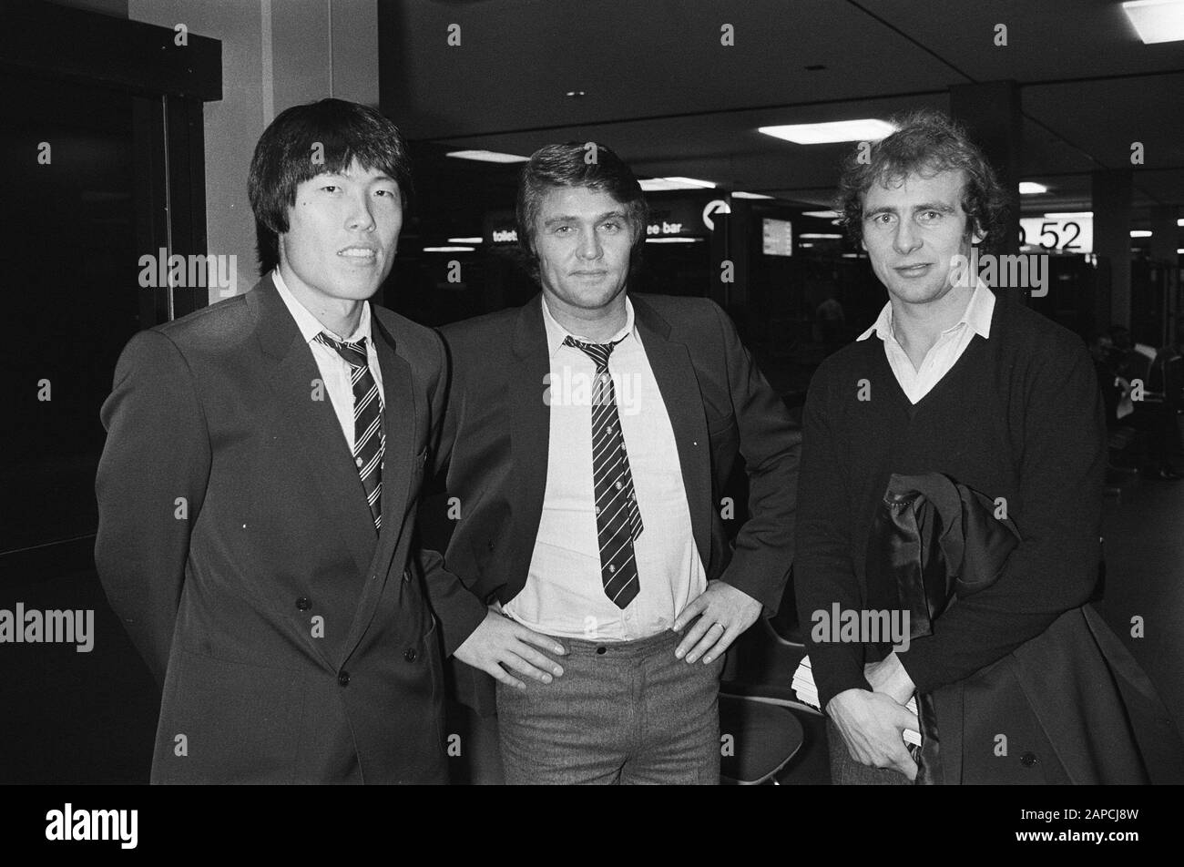 Arrival of the Eintracht Frankfurt football team at Schiphol due to the UEFA Cup match against Feyenoord; v.l.n.r. Cha, trainer Rausch and Hölzenbein Date: 11 December 1979 Location: Noord- Holland, Schiphol Keywords: sport, trainers, airports, football Personal name: Cha Bum-Kun, Hölzenbein, Bernd, Rausch, Friedel Institution name: Feyenoord Stock Photo