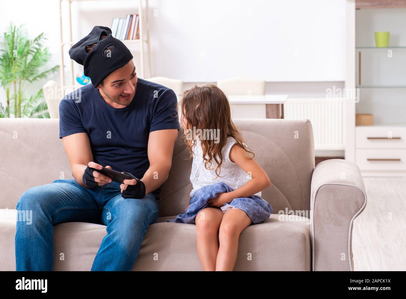 The child trafficking and abuse concept with small girl Stock Photo - Alamy