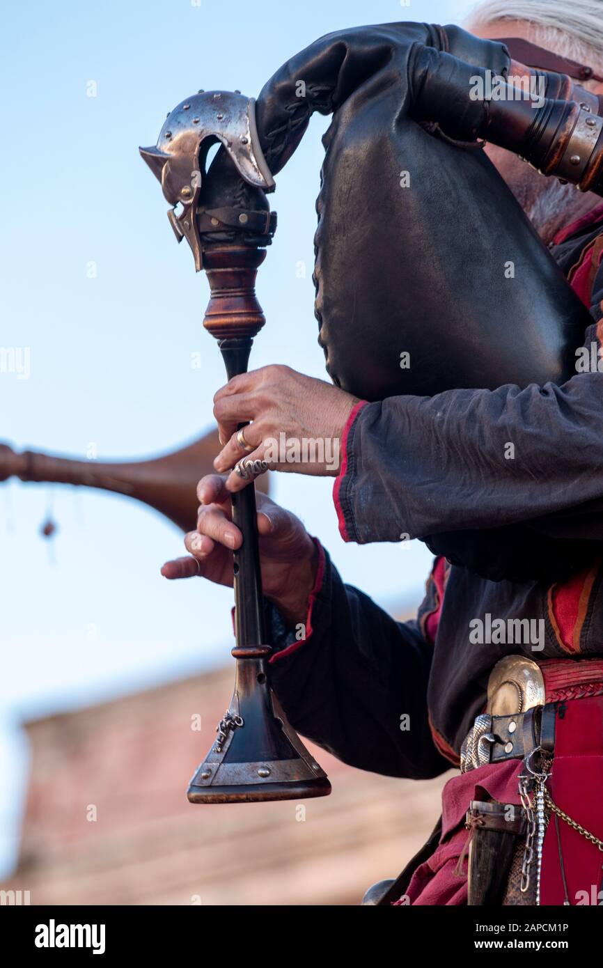 Medieval music player playing the bagpipe Stock Photo Alamy