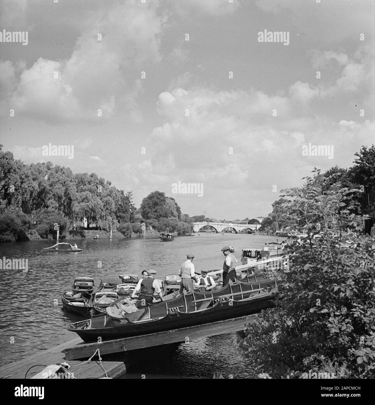 Bank Holiday Description: Boating for rowing boats in the River Thames Annotation: 'Bank Holiday' is the English word for a day when banks and public institutions are closed and many people are free Date: 1947 Location: England, London Keywords: rivers, rowing boats Stock Photo