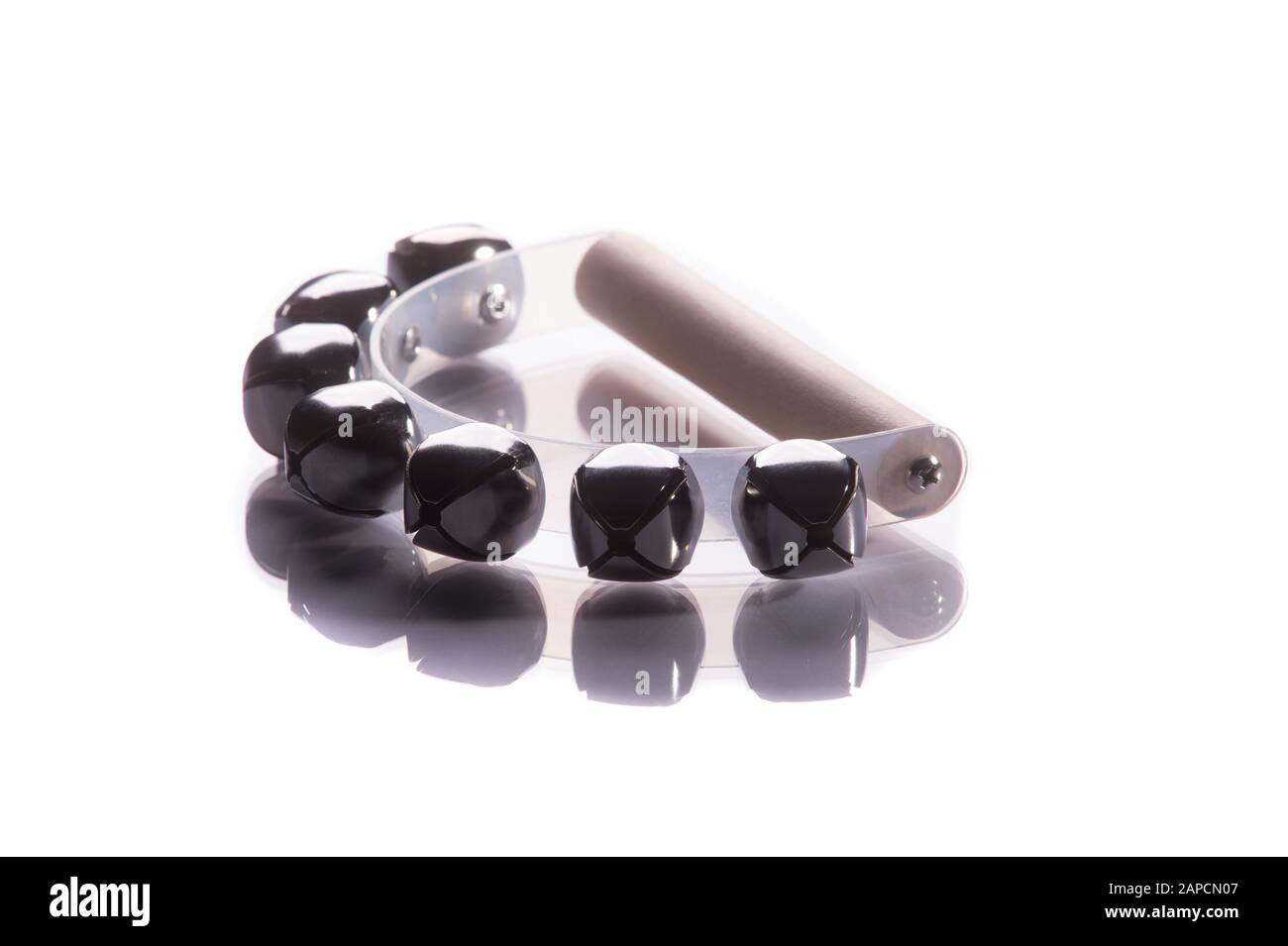 Hand bells musical instrument for ringing on a white background Stock Photo Alamy