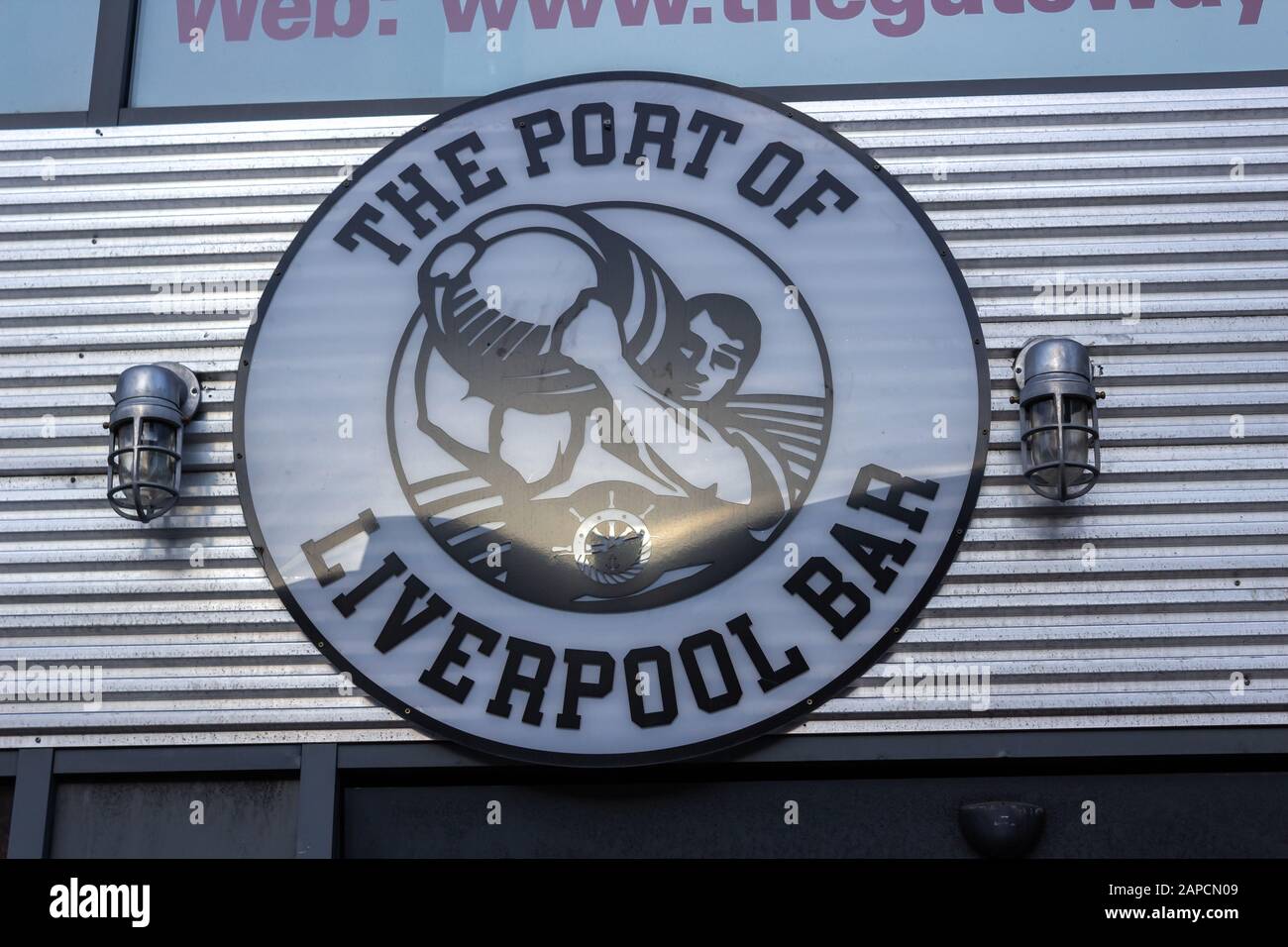The Port of Liverpoool bar and restaurant sign and logo of strongman carrying beer barrel cask, London road, Liverpool Stock Photo