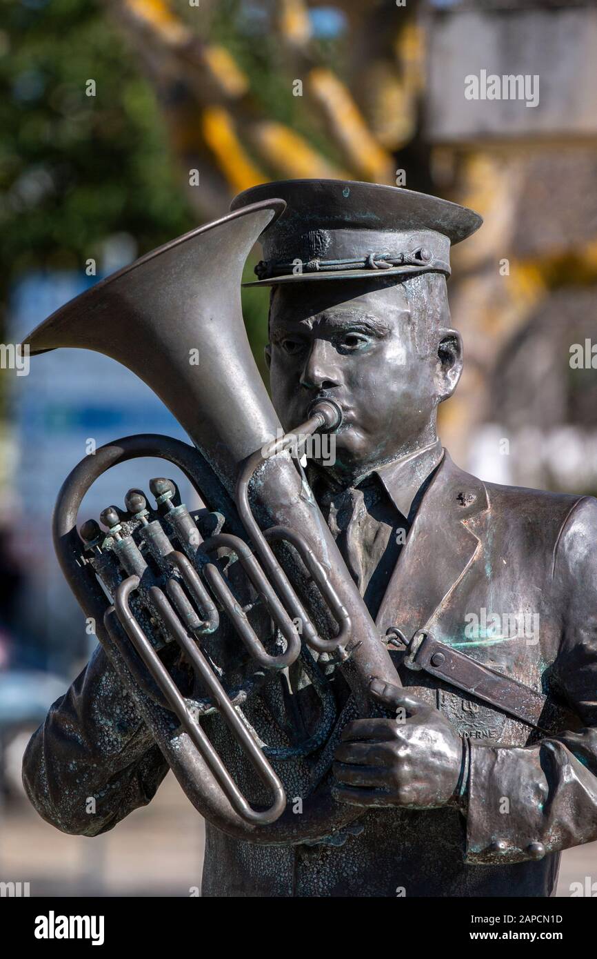 View of a statue of a musician tuba player located in Paderne, Portugal