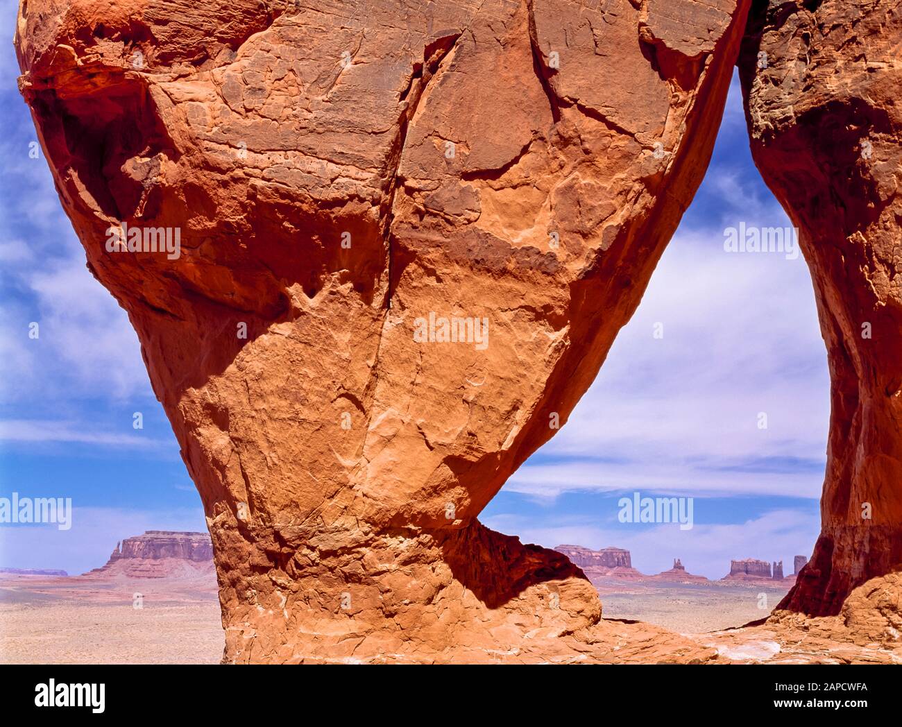 teardrop arch overlooking monument valley on the navajo indian
