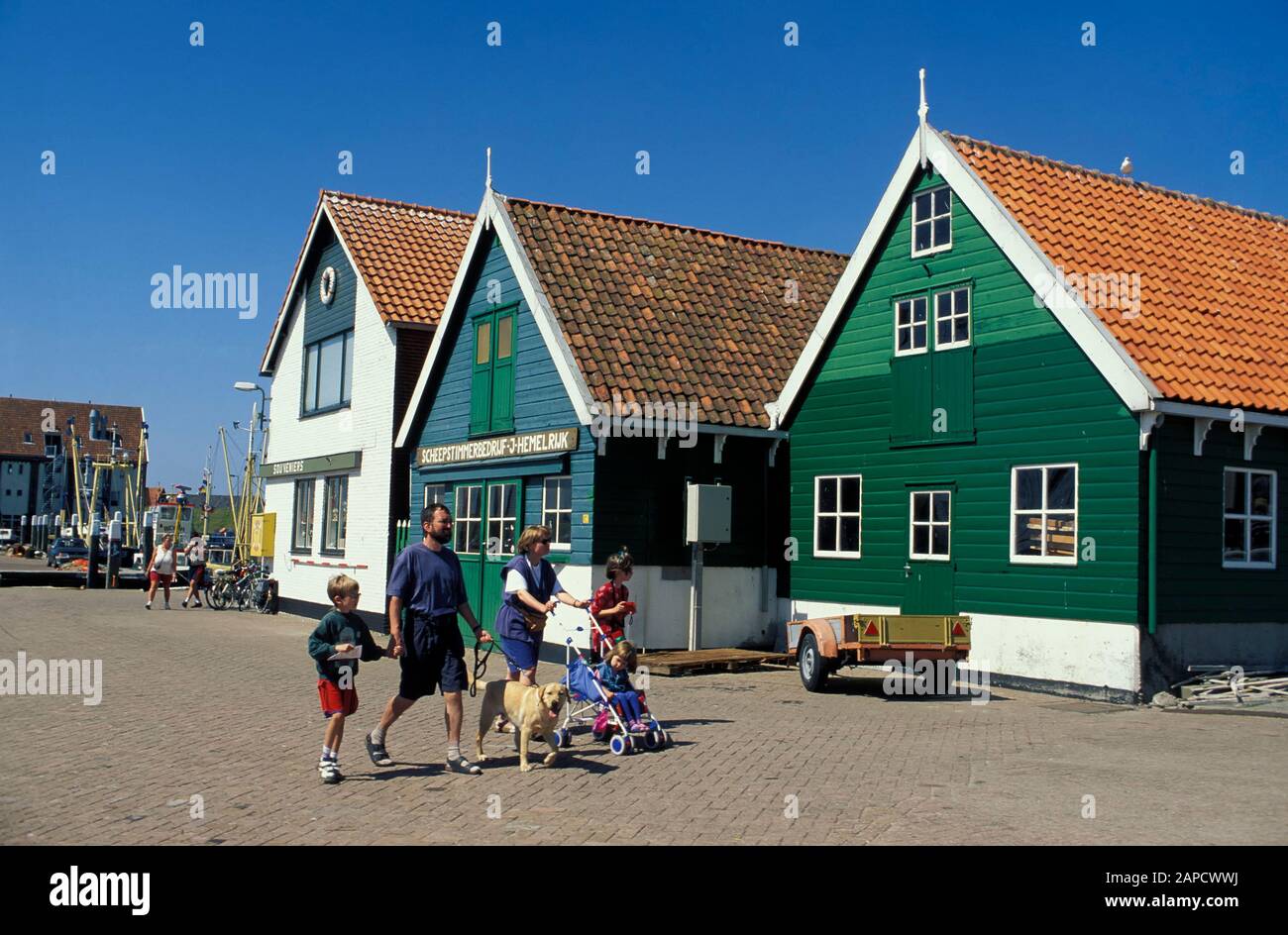 Old fisher houses in the harbour of  Oudeschild,  Texel Island, North Sea, Netherlands, Europe Stock Photo