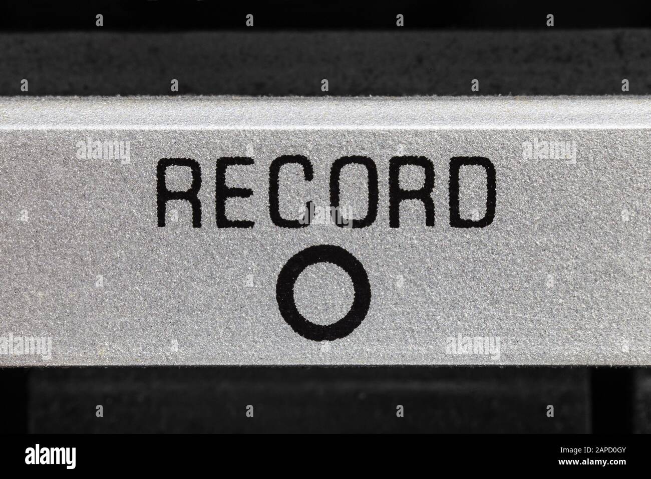 Macro close up photograph of vintage boombox tape record button detail. Stock Photo