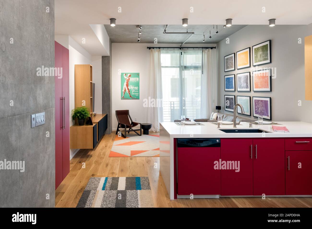 View from kitchen to living space in modern apartment design Stock Photo