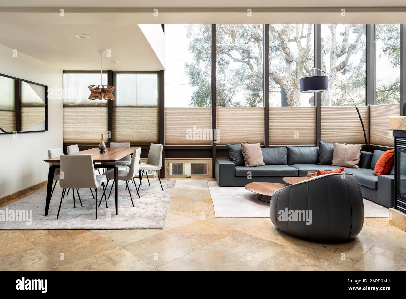 Modern Residential Living And Dining Room With Floor To Ceiling