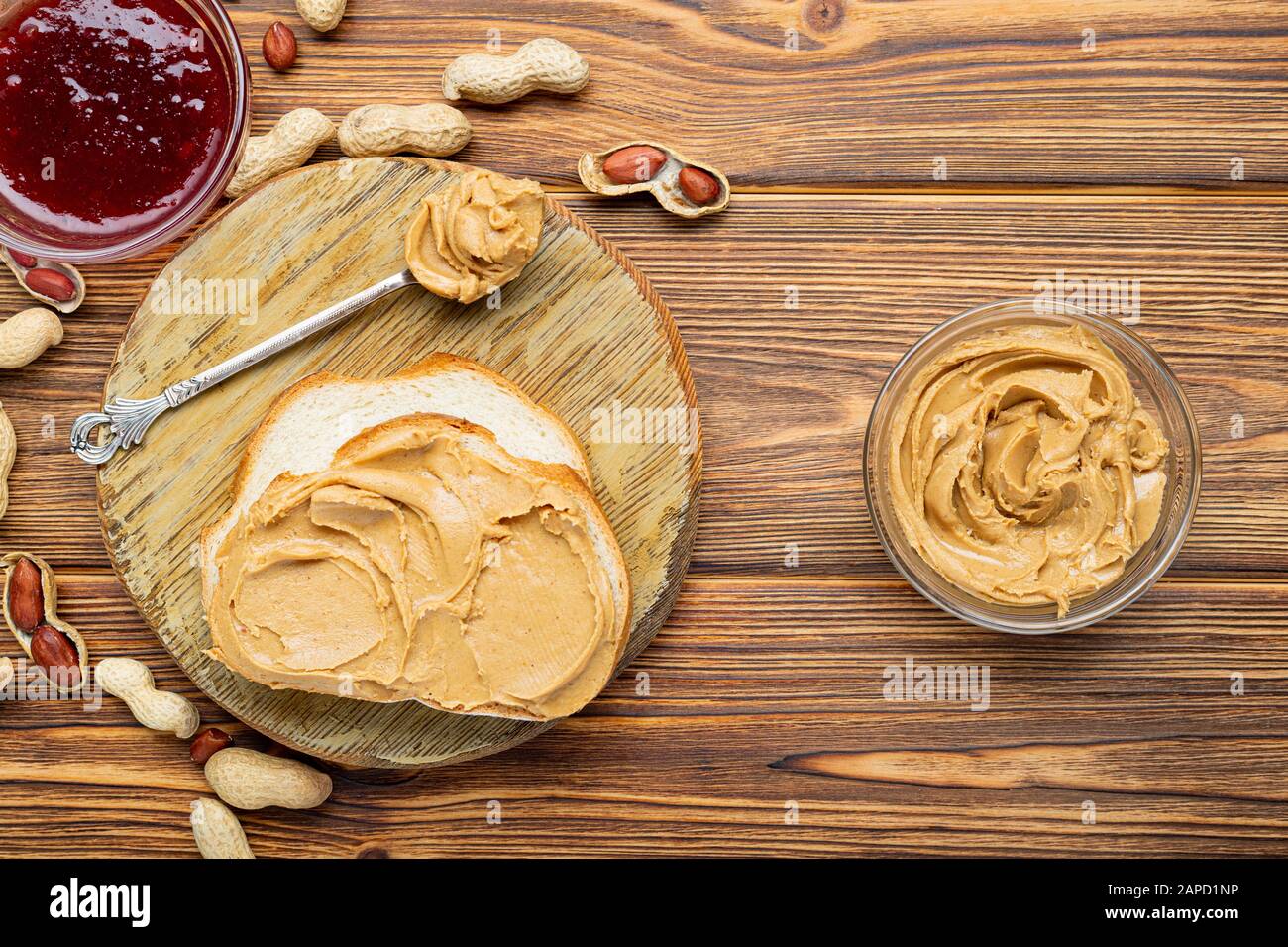 An Open Jar Of Peanut Butter With Spoon Stock Photo, Picture and Royalty  Free Image. Image 13094043.