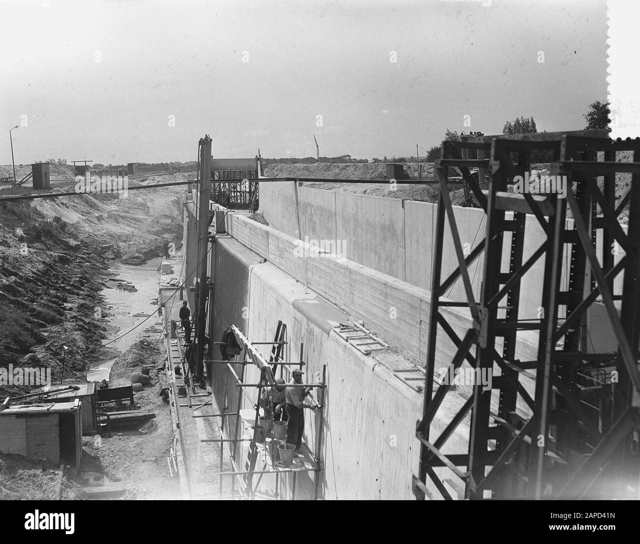 Construction Velser tunnel, tunnel exit with connection to railway Date: August 4, 1955 Keywords: RAILWAYS, TUNNERLINS Name: Velsertunnel Stock Photo