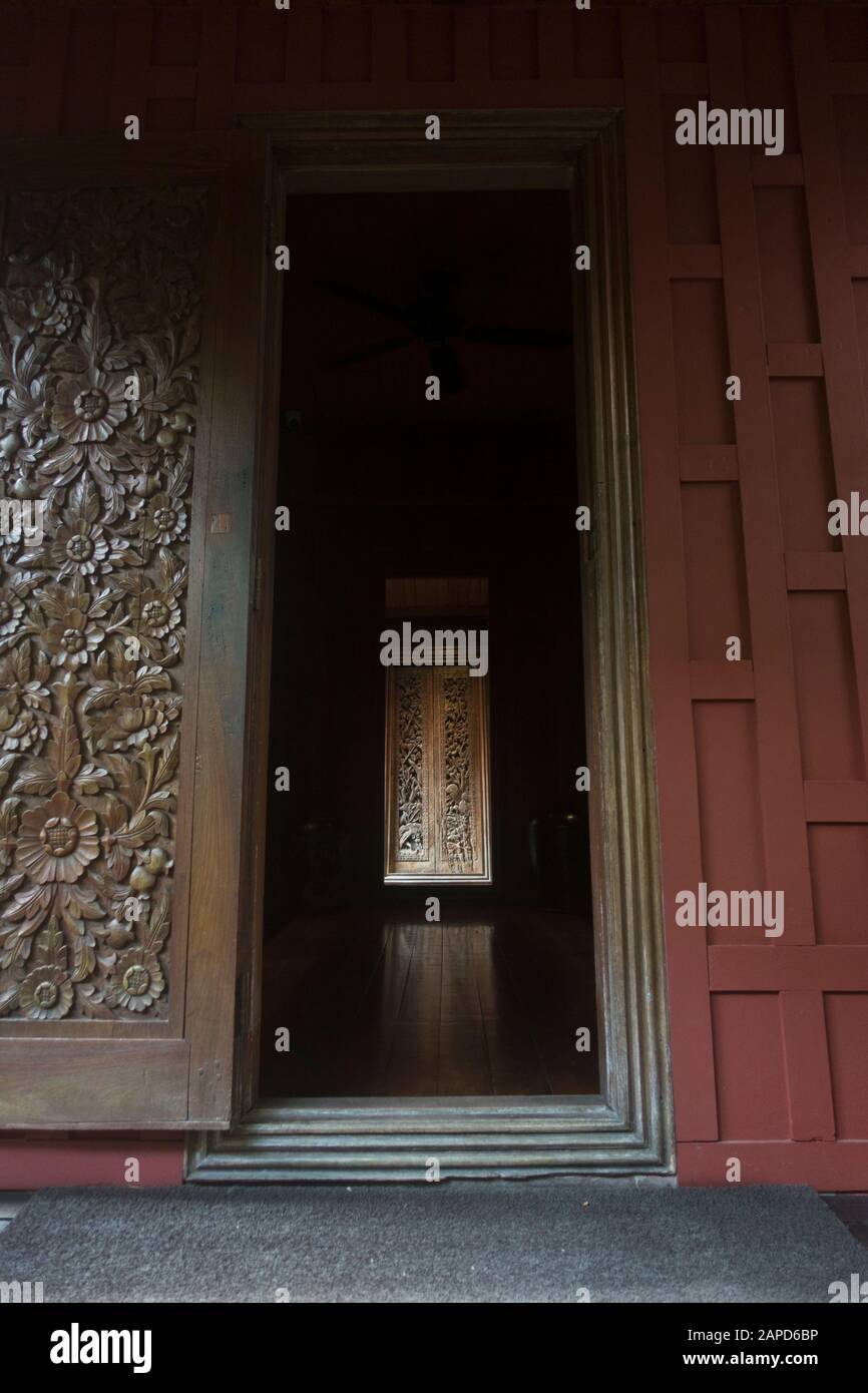 Jim Thompson's entrance to his Thai inspired house. He  was an American businessman who helped revitalise the Thai silk industry in the 1950's to 60's Stock Photo