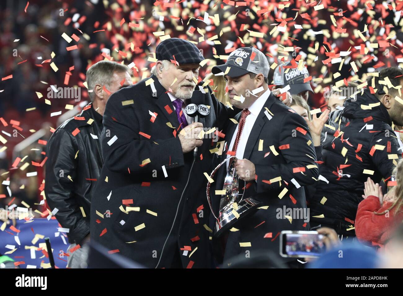 FOX broadcaster Terry Bradshaw presents the George Halas Trophy to San Francisco 49ers CEO Jed York following the NFL football NFC Championship game, Sunday, Jan. 19, 2020, in Santa Clara, Calif. The 49ers defeated the Green Bay Packers 37-20 to advance to the Super Bowl. (Photo by IOS/ESPA-Images) Stock Photo