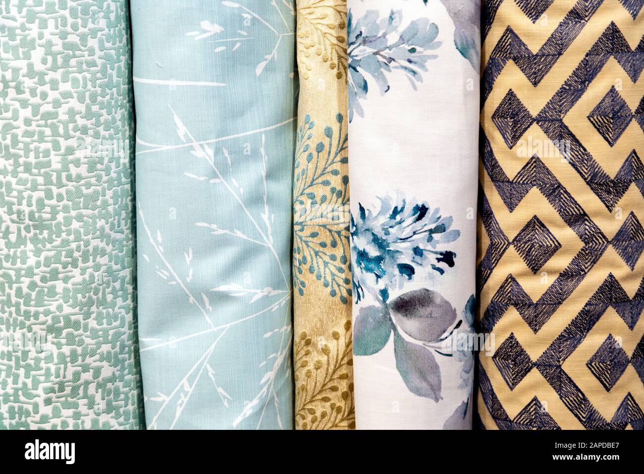 Rolls of printed fabric selection Stock Photo