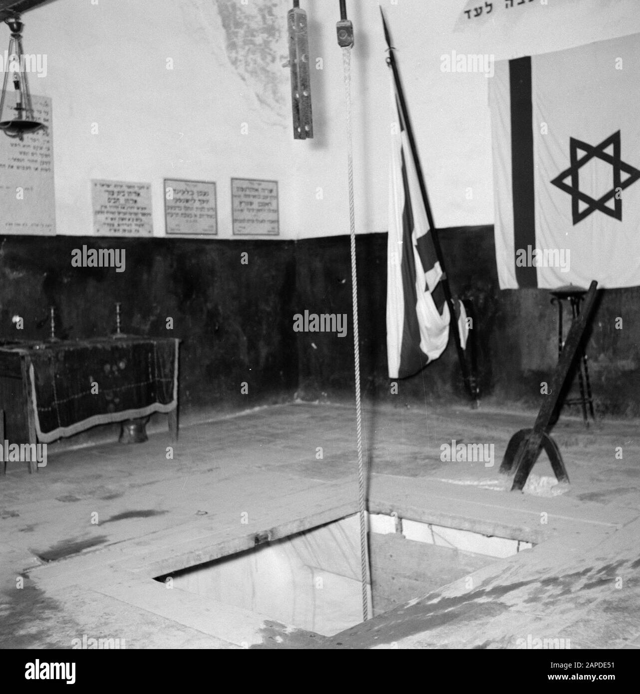 Israel 1964-1965: Akko (Acre), Citadel-prison Description: Akko, citadel. Execution room with gallows and trapdoor. Here, nine members of the Jewish resistance were executed by the British Annotation: A citadel is a (often star-shaped) fortification that dominates a fortified city and makes itself defensible. When the British conquered Akko, they made various changes to the building. They turned the whole building into the central prison of Palestine. After the establishment of the State of Israel became the prison a psychiatric hospital Date: 1964 Location: Acre, Israel Keywords: doors, execu Stock Photo