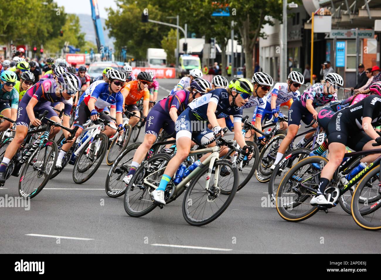 Riders competing in stage 4 of the Women's Tour Down Under through the streets of Adelaide Australia. Stock Photo