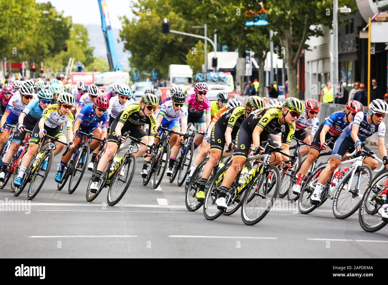 Riders competing in stage 4 of the Women's Tour Down Under through the streets of Adelaide Australia. Stock Photo