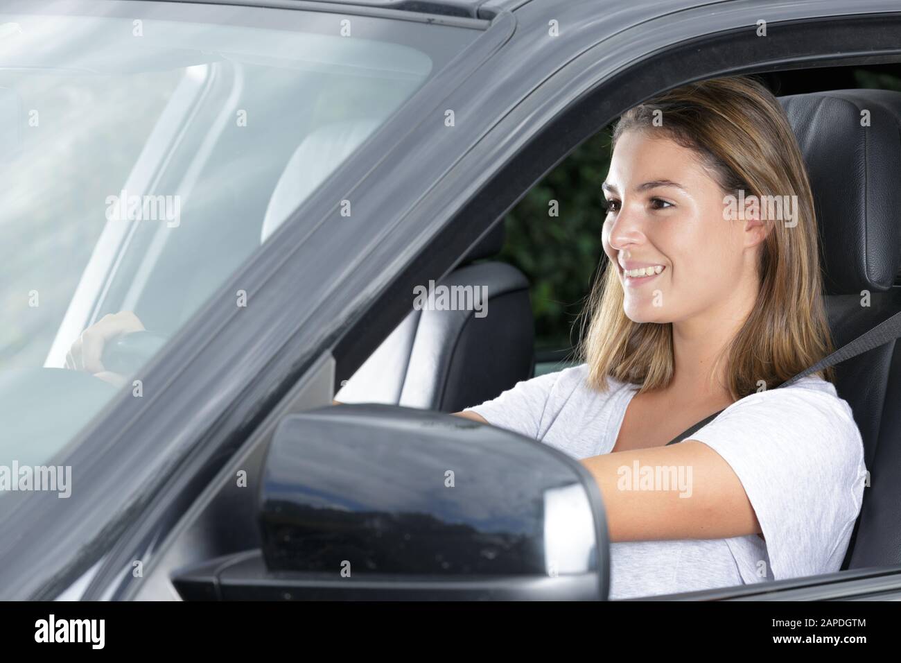 woman in car happy Stock Photo - Alamy