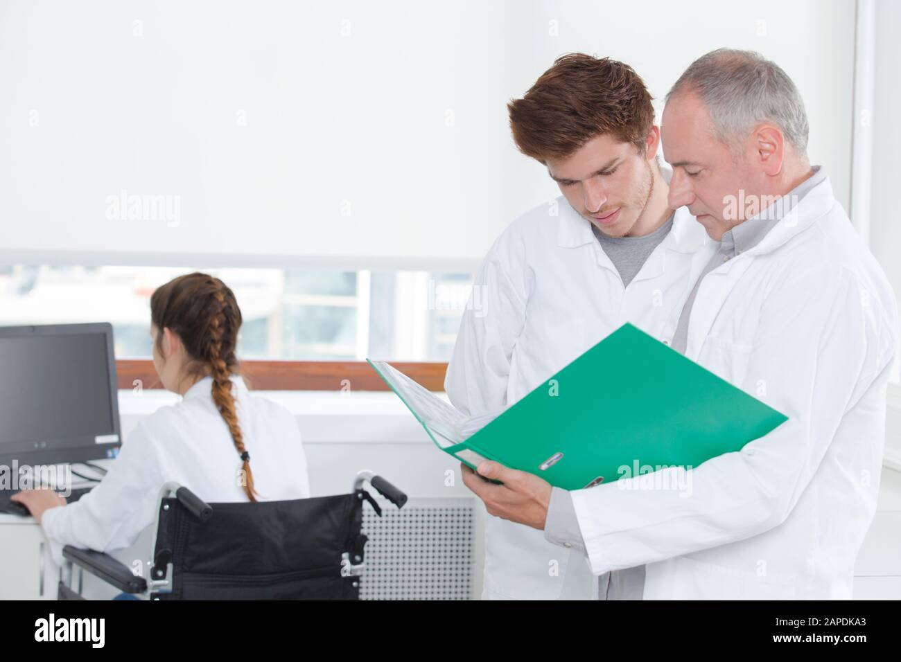science student in wheelchair working at university Stock Photo Alamy