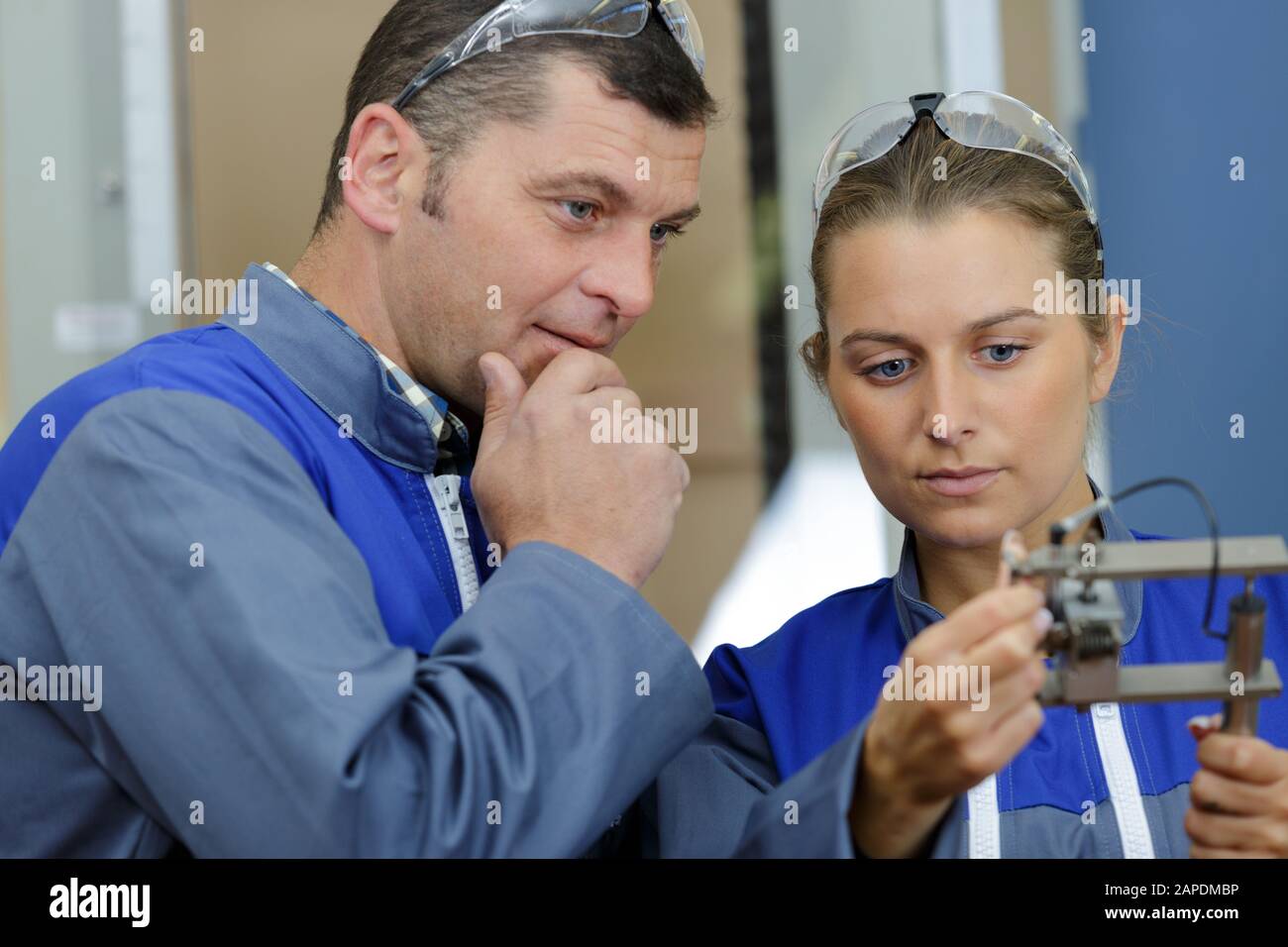 two workers in the factory Stock Photo