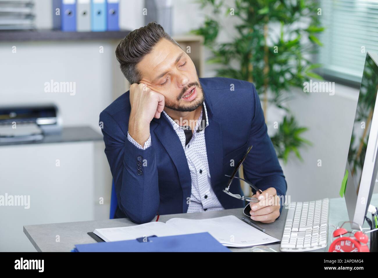 Man Fallen Asleep At Office Desk Stock Photo 340820932 Alamy
