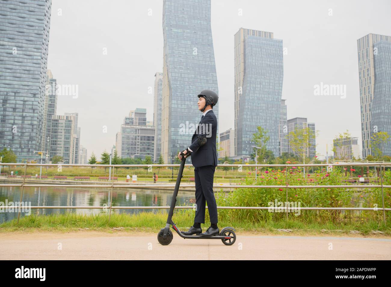 Smart mobility life concept, young man using an electric car, electric