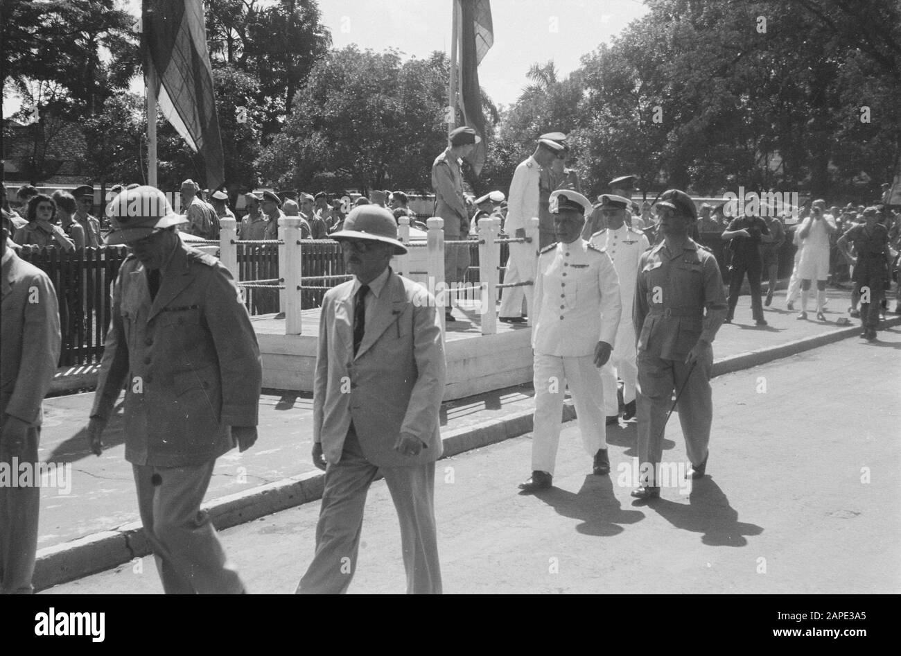 Parade t.g.v. birthday of Princess Juliana Description: Authorities leave the stage. Vlnr. Van Mook, Commissioner-General Van Poll, Vice Admiral Pinke, Army Commander General Spoor Date: 30 April 1947 Location: Batavia, Indonesia, Jakarta, Dutch East Indies Stock Photo