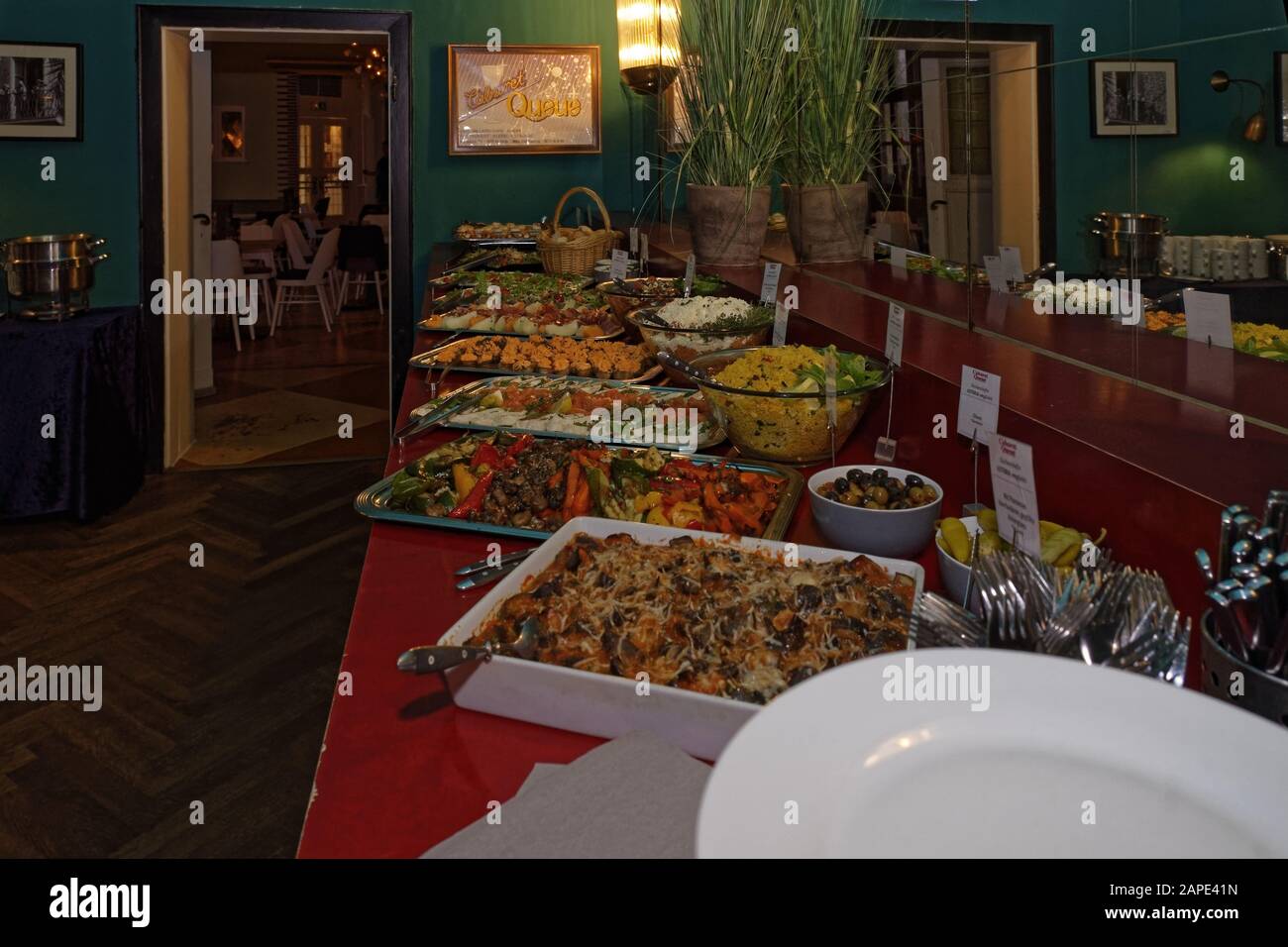 A Beautiful Shot Of Delicious Food Lined Up On A Buffet Table In A