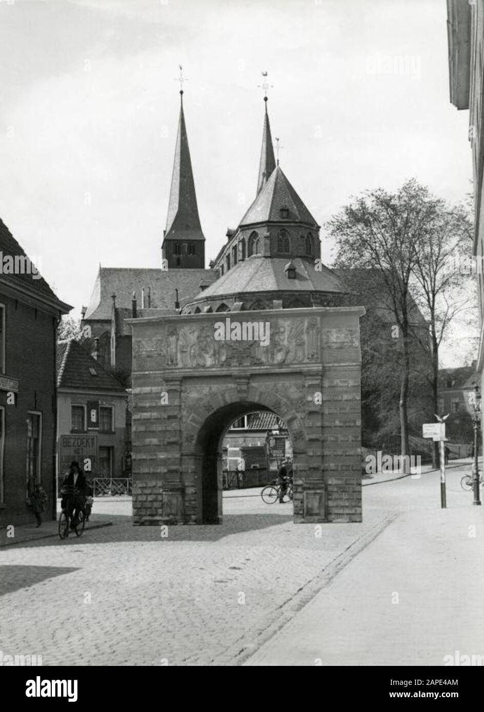 Photo montage of the old Bergpoort in its old surroundings in Deventer, [1933]. [The gate was demolished in 1879 and then rebuilt in the garden of the Rijksmuseum in Amsterdam]. Stock Photo