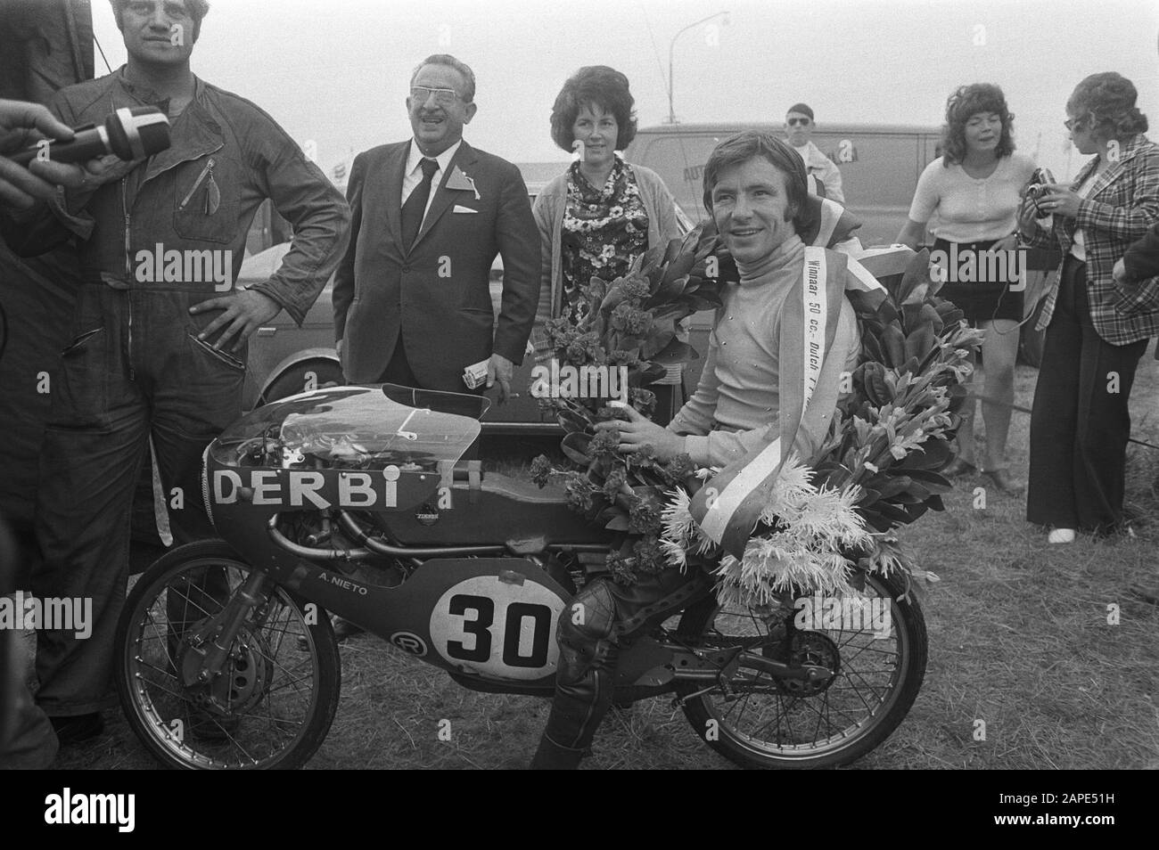 Español: Ángel Nieto con la Derbi 50cc in Assen, 1972 The Spanish motorcycle driver Angel Nieto wins in the 50cc class on his Derbi; Stock Photo