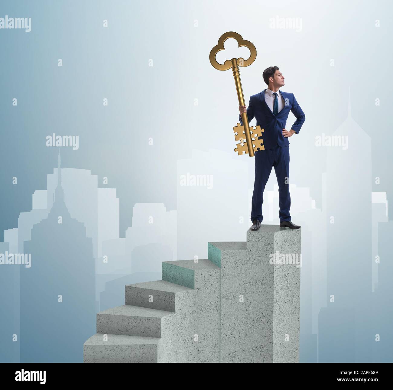 The businessman with key to success at the top of career Stock Photo ...