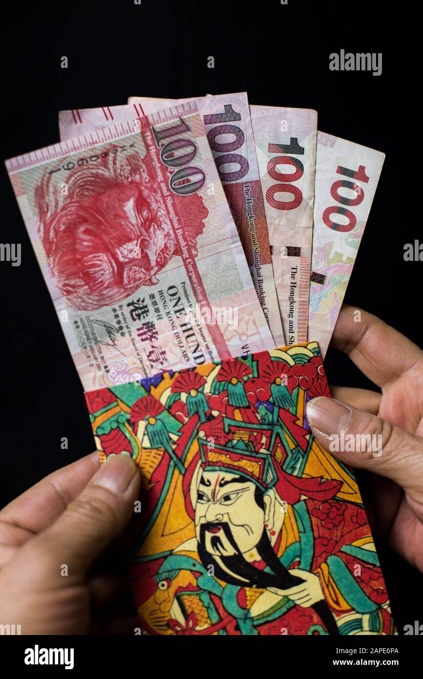 Singapore dollar in red packet hi-res stock photography and images - Alamy