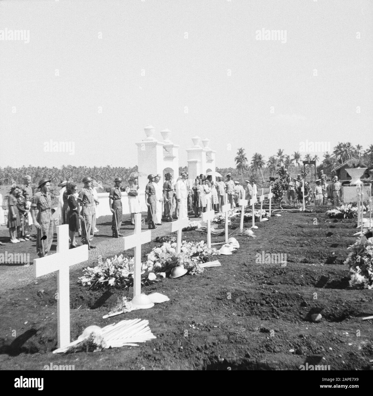 Re-burial of war victims at the Menteng Poeloeh honorary cemetery in Batavia Description: Batavia: On April 5th, a massive reburial of war victims took place on The Field of Honor Menteng Puluh. Annotation: Reburial of 21 war victims killed in Japan: A. van Barthold; A. A. Doonen; J. v. Eggelen; F. Goosens; M. Th. de Korte; Th. W. v. Loo; P. Lauterbach; P. de Maker, E. L. v. Menxel; H. C. v. d. Maal; J. Romeijn; M. Ruru; F. C. Steinmetz; J. T. Segers; J.L.H. v. Spek; R.H. Teuscher; F. Tangkilisan; w. Verhoeven; A. Iron. Date: 5 April 1948 Location: Batavia, Indonesia, Jakarta, Dutch East Indie Stock Photo