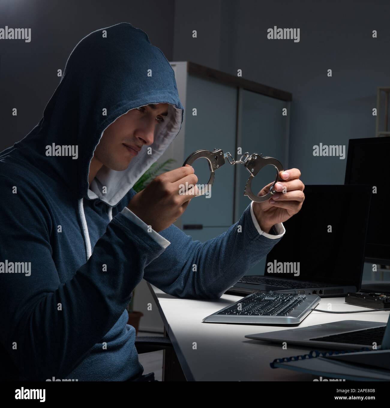 The hacker hacking computer at night Stock Photo - Alamy