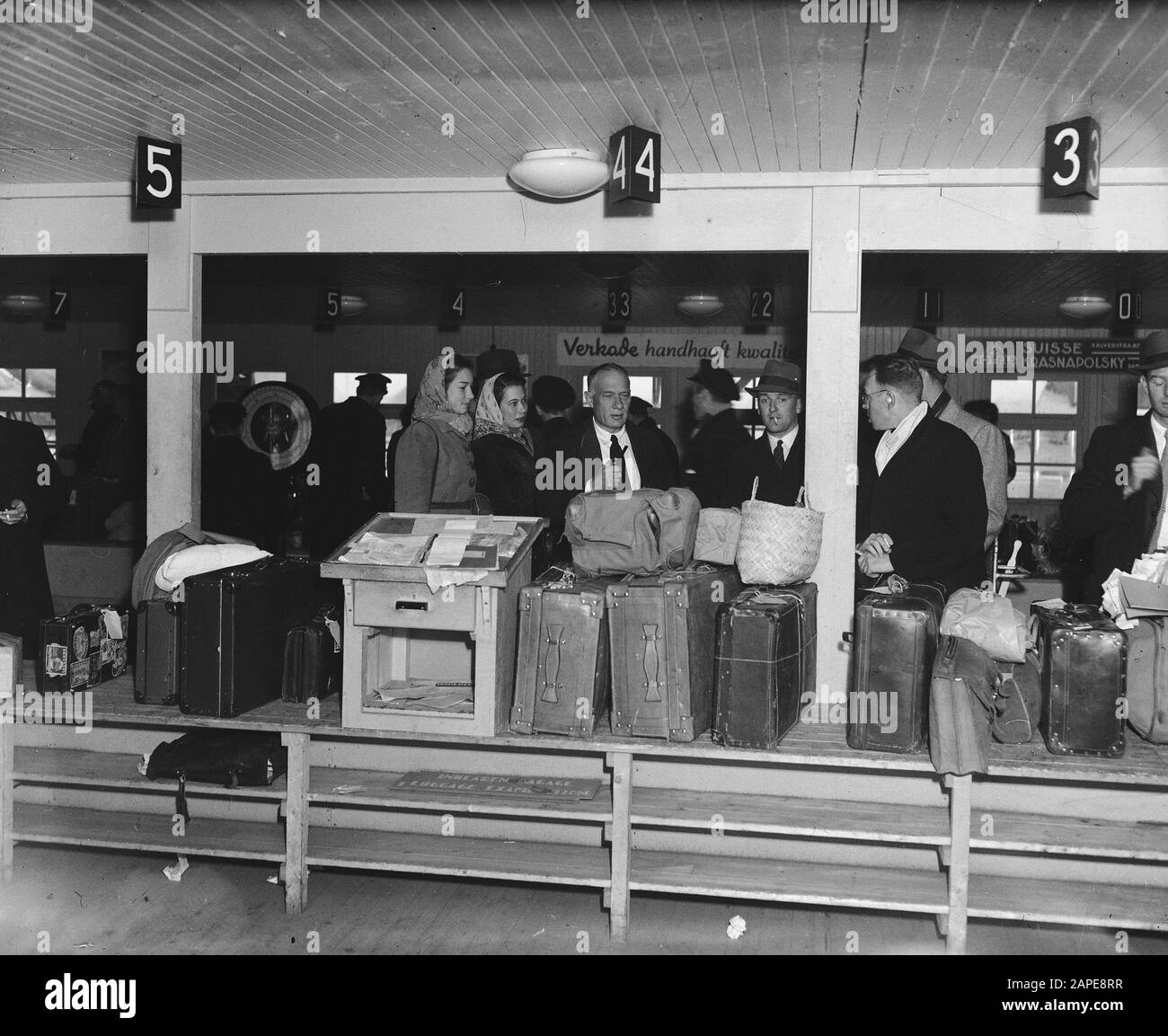 Admiraal Pinke at Schiphol at the customs Date: December 9, 1947 Location: Amsterdam, Noord-Holland Keywords: CUSTOSANE Stock Photo