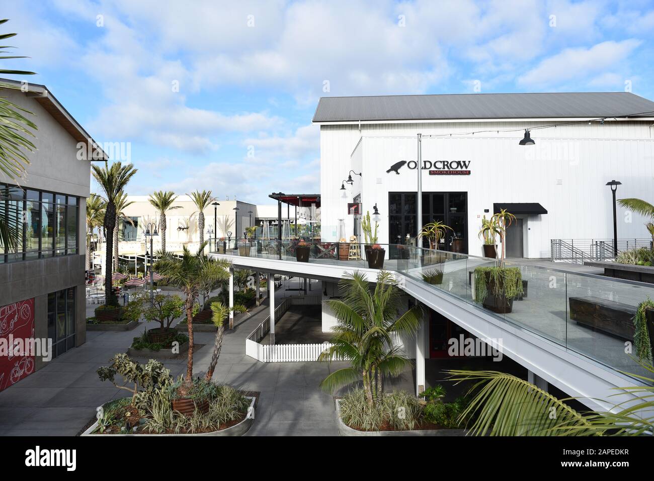 HUNTINGTON BEACH, CALIFORNIA - 22 JAN 2020: Shops and restaurants at Pacific City. The upscale development is on the Pacific Coast Highway. Stock Photo