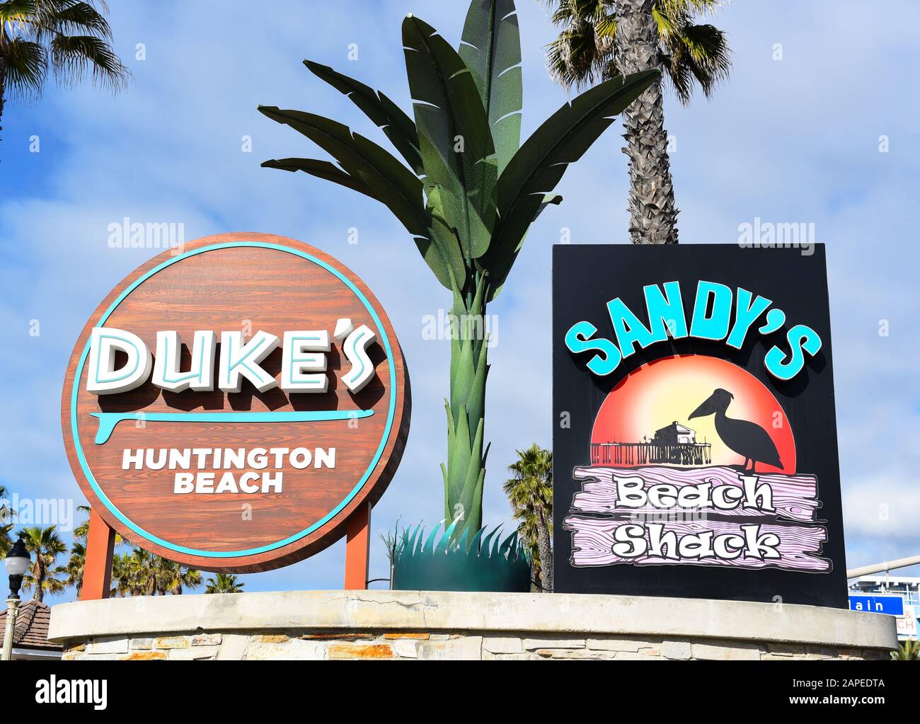 HUNTINGTON BEACH, CALIFORNIA - 22 JAN 2020: Closeup of the sign for Dukes Restaurant and Sandys Beach Shack at the pier in Huntington Beach. Stock Photo