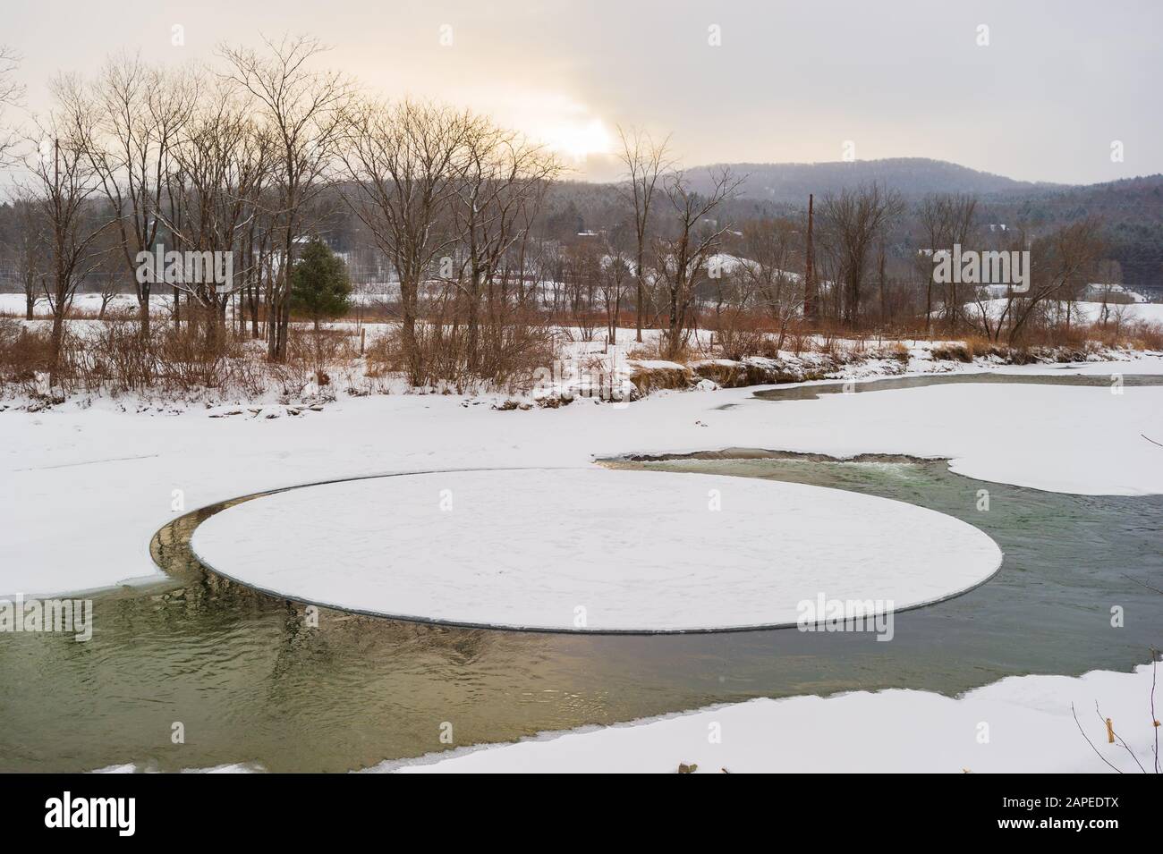 Rare ice circle in the Little River near Moscow Vermont USA Stock Photo
