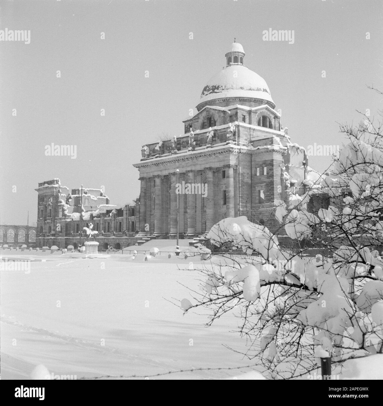Visit to Munich Description: Snowy Hofgarten with the ruins of the Bayerische Staatskanzlei Date: December 1, 1958 Location: Bavaria, Germany, Munich, West Germany Keywords: parks, parliament buildings, ruins, snow, winter Stock Photo