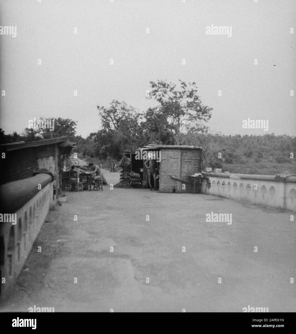 Security post on a bridge Annotation: DJKNIET IN order Date: 1947 Location: Indonesia, Dutch East Indies Stock Photo
