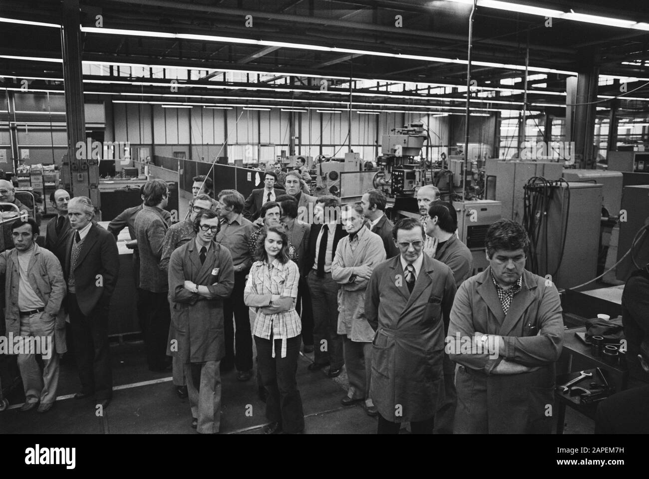 Occupation Tealtronic; employees during meeting in the factory hall Date: 10 January 1977 Keywords: occupancy, WORKERS, meetings Stock Photo