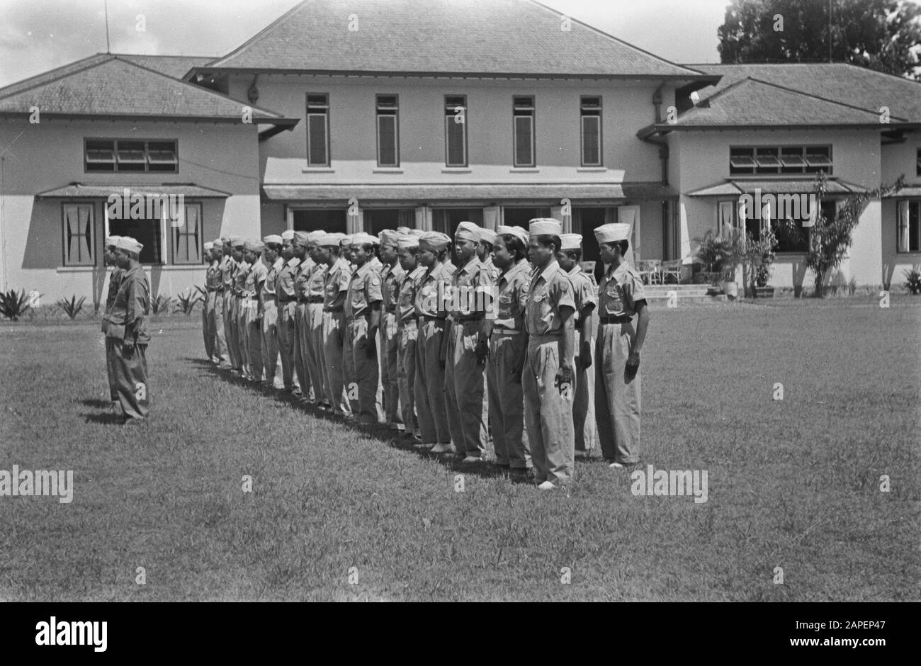 Makassar. Visit by Prime Minister Beel; Troop movement; Hadjizwaard; Major General Sas Description: Visit by Prime Minister Beel. In the garden of the residence office? Is there a guard of honor KNIL recruits? took office. Date: December 1948 Location: Indonesia, Dutch East Indies Stock Photo