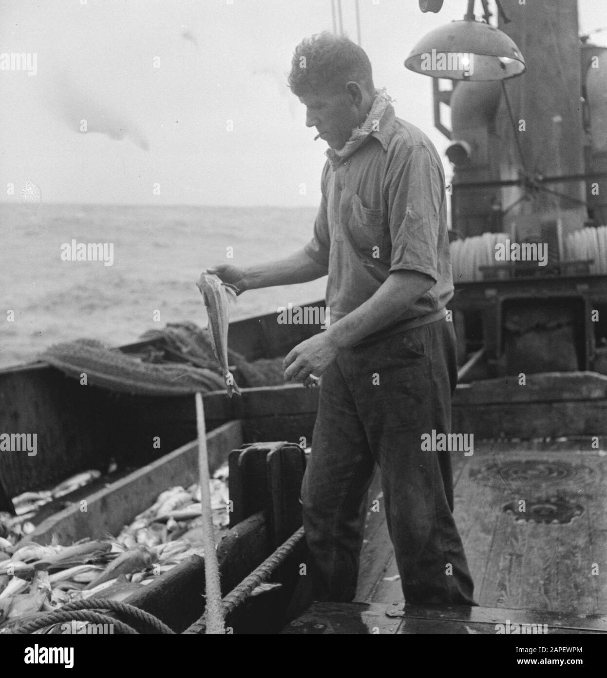 Trawler Wwii Fishing trawler crew Black and White Stock Photos & Images - Alamy