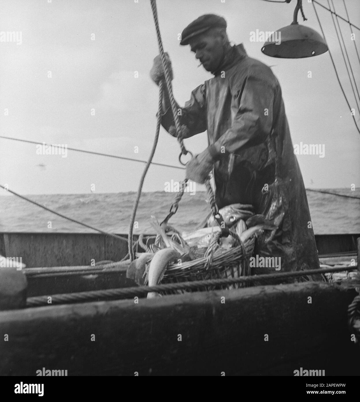 Fishing trawler sea crew Black and White Stock Photos & Images - Alamy