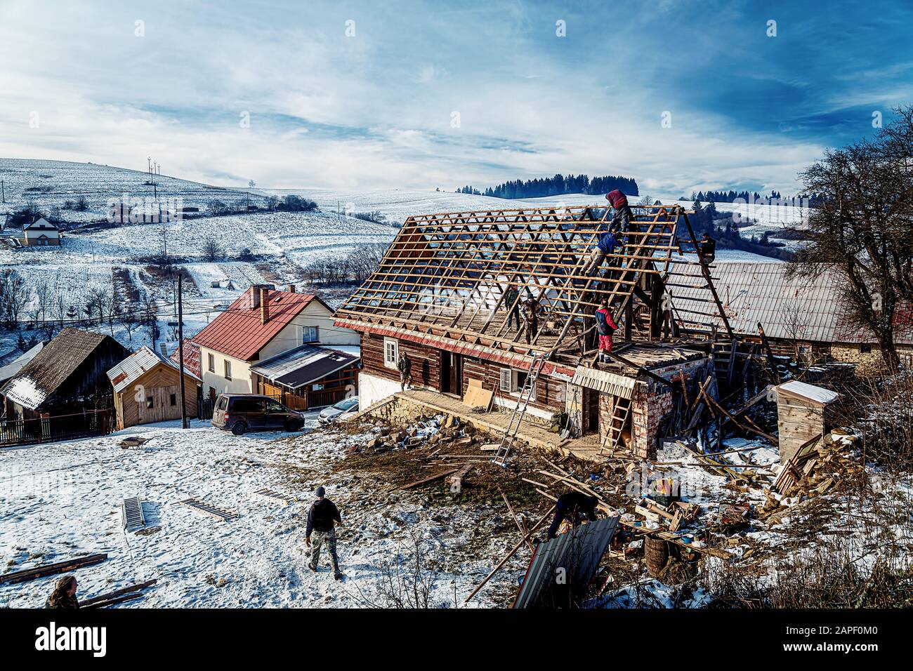 Pokryvac, Slovakia, January 2, 2020. Disassembling old wooden cottage, Orava wooden cottage. Stock Photo