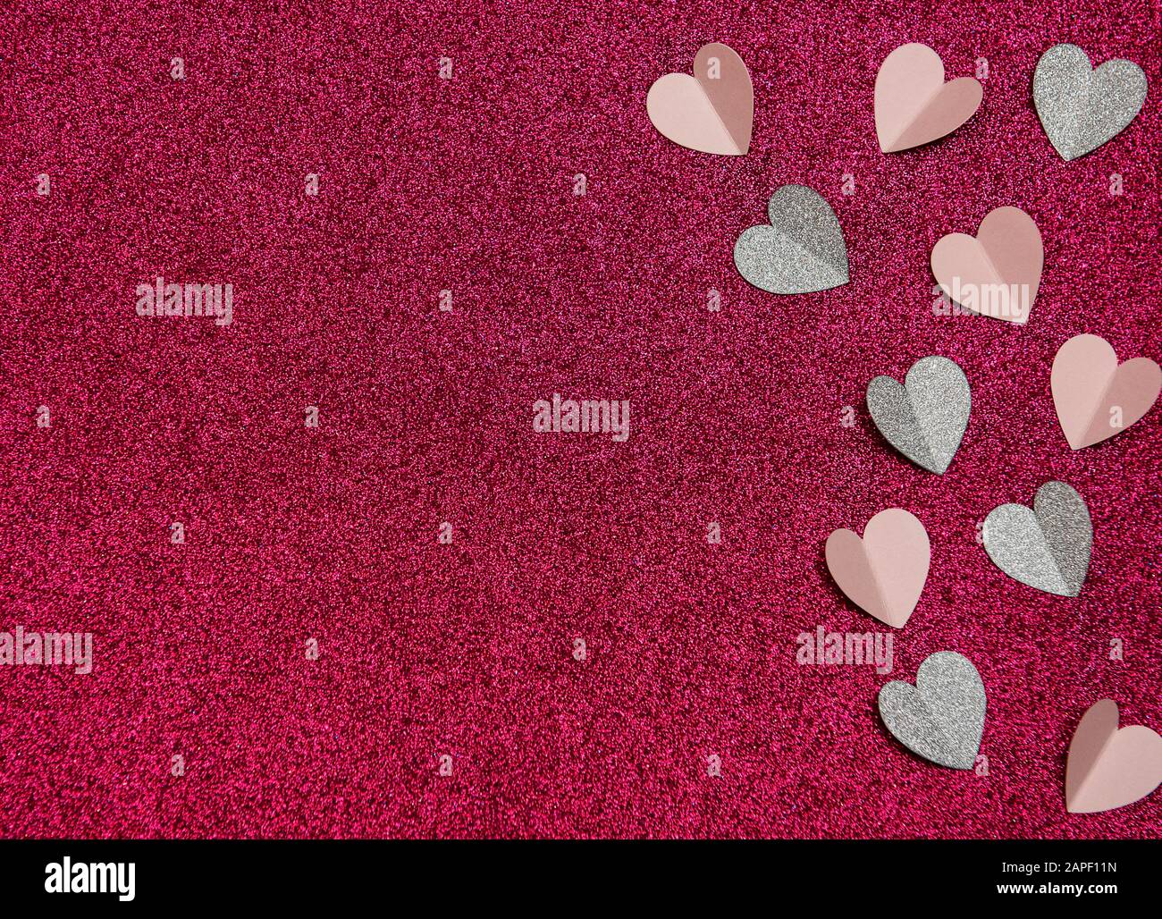 Hearts made of paper on a pink background, top view. Pink background ...