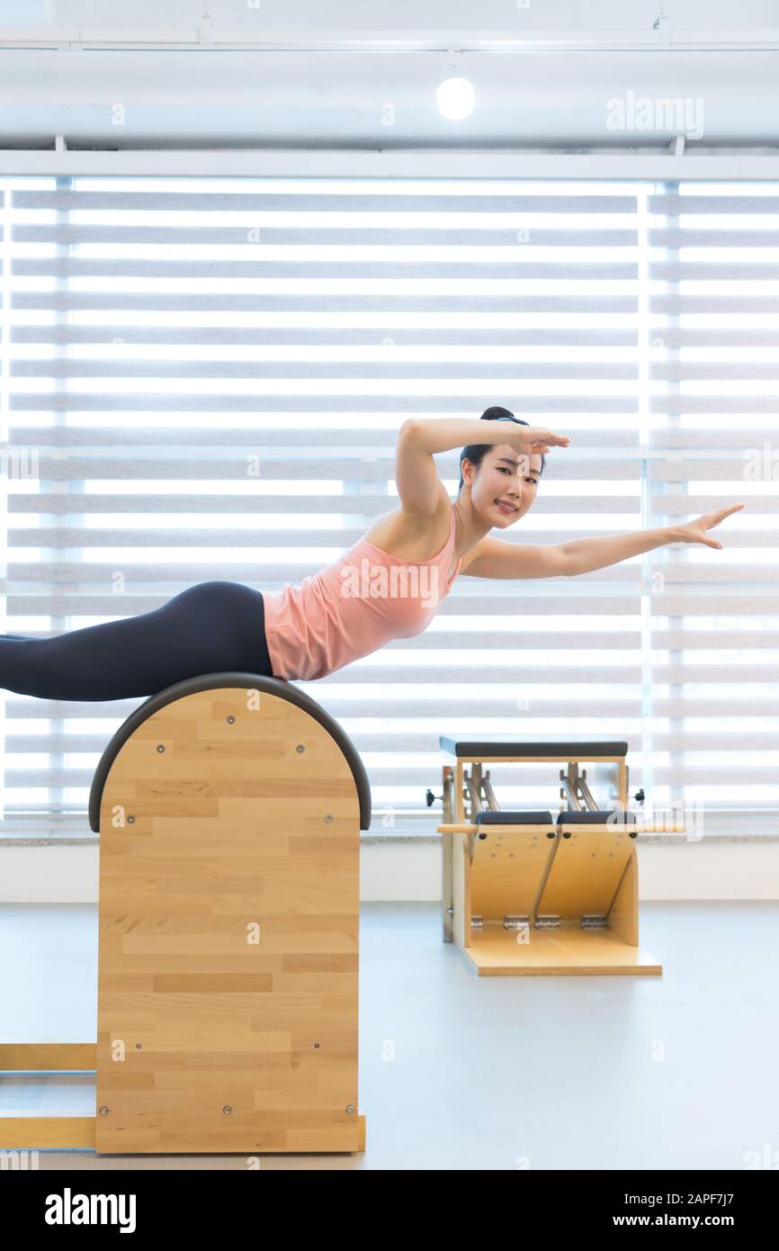 Healthy life, exercising pilates using pilates device 247 Stock Photo Alamy