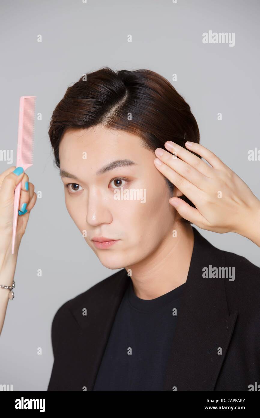 Close-up portrait of attractive young asian man, single man's lifestyle ...